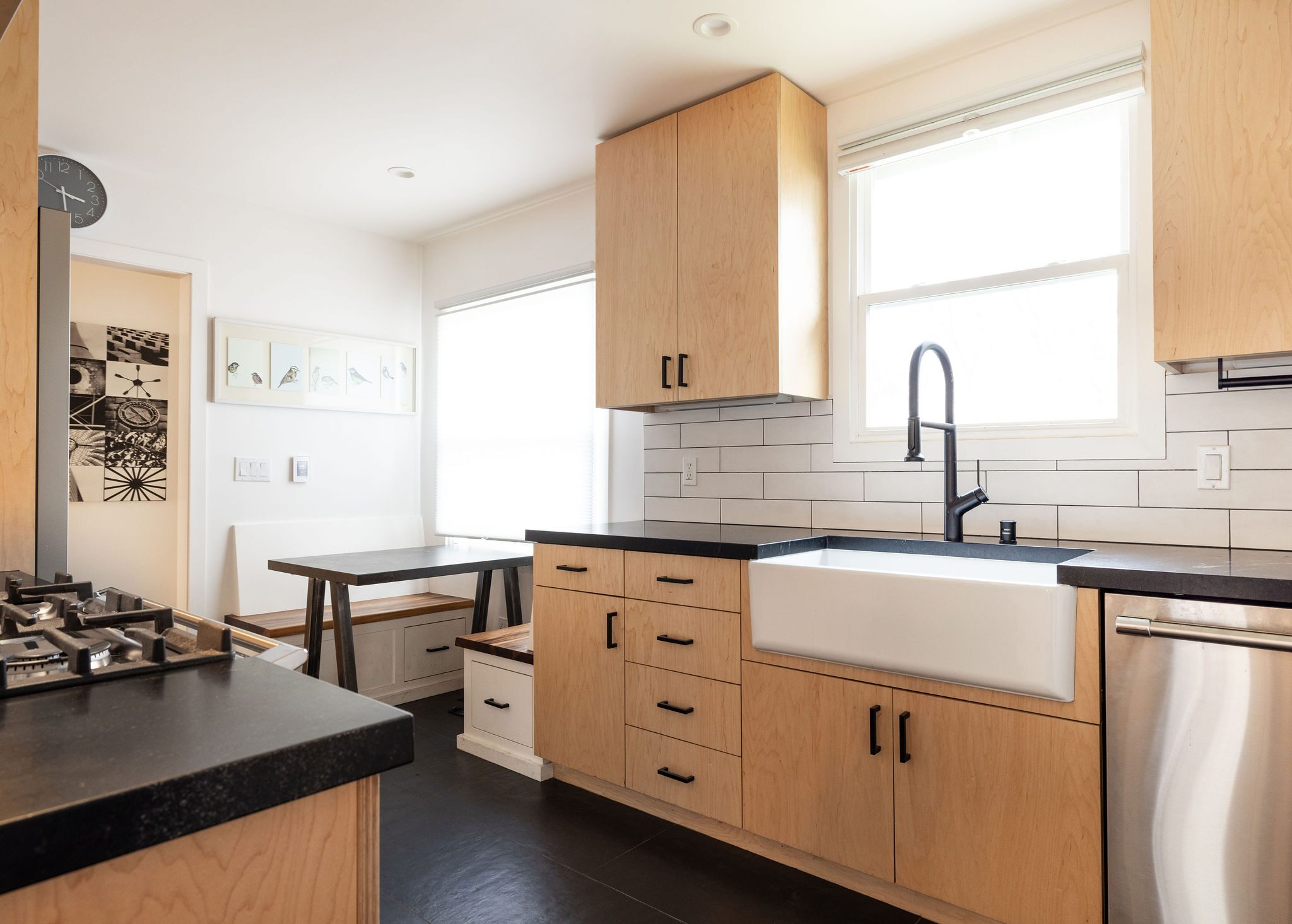 Full kitchen remodel with farmhouse sink and subway tile by Build Shepherd