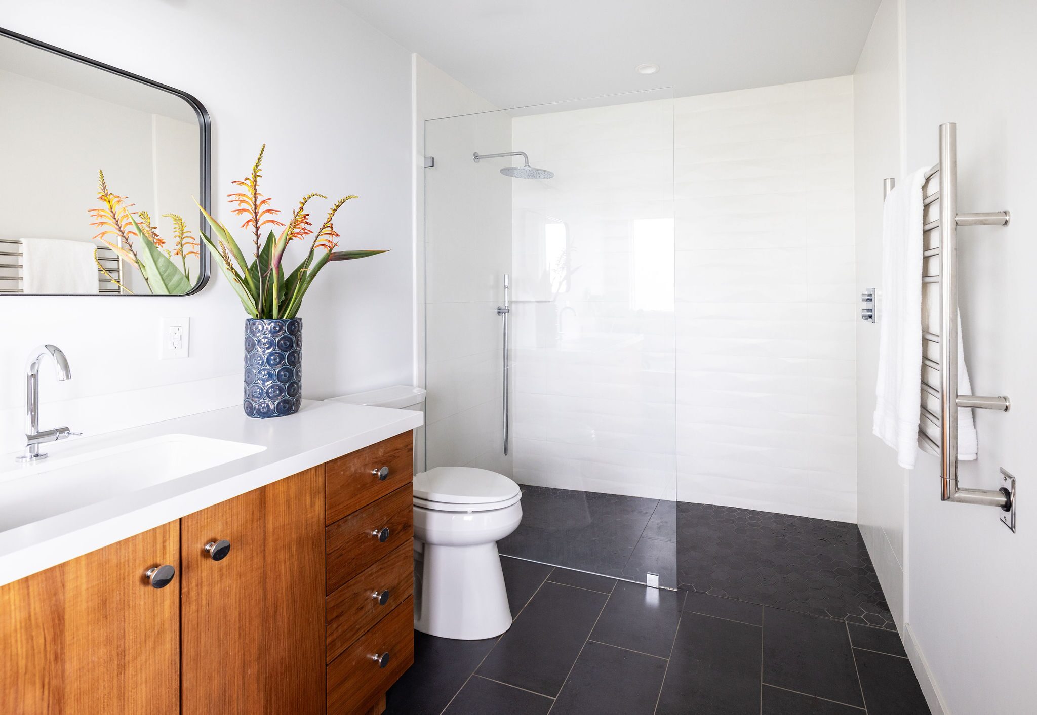 Full bathroom remodel with walk-in shower and vanity by Build Shepherd